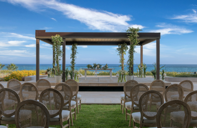 //www.jet2holidays.com/-/media/custom overview images/j2w/event lawn -wedding ceremony set up.jpg