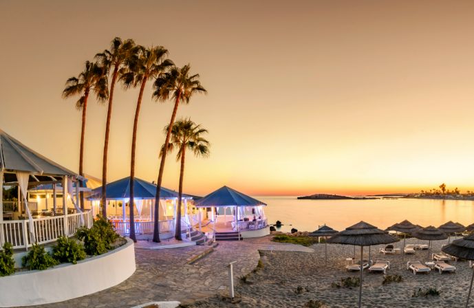 //www.jet2holidays.com/-/media/custom overview images/j2w/nissi beach/rondavel at sunset.jpg