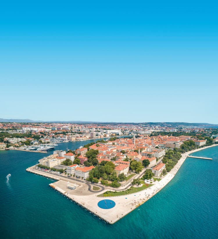 Aerial Panorama of the beautiful city Zadar with its famous Sea Organ located on a peninsula in the Mediterranean Sea. Converted from RAW.
