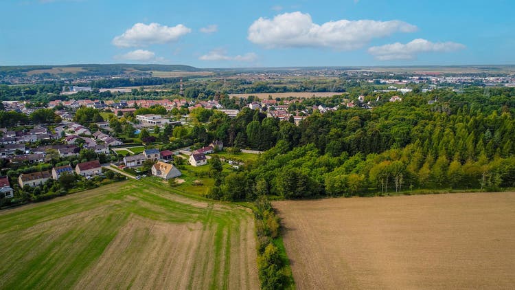The Regional Natural Park of the French Vexin seen from the sky is located in the north-west of the Île de France. It covers about 1400 km2 and has more than 100,000 inhabitants.