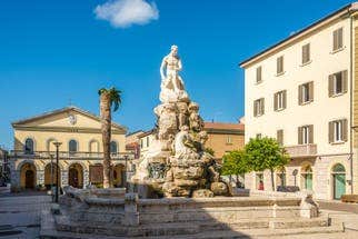 Coastal Italian town with sandy beaches and Mediterranean promenade